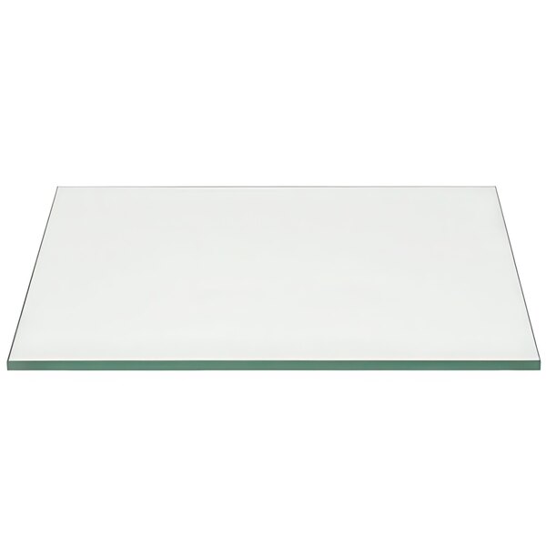 A clear rectangular glass buffet board.