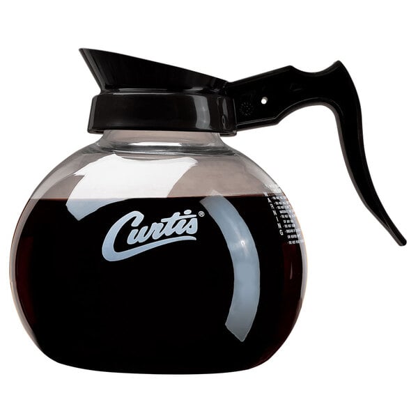 A Curtis glass coffee decanter with a black handle.