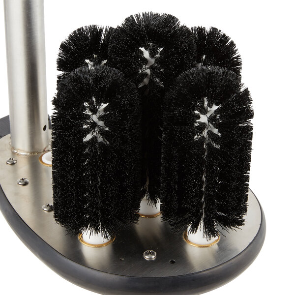 A circular brush holder with black bristles for Galaxy glass washers.