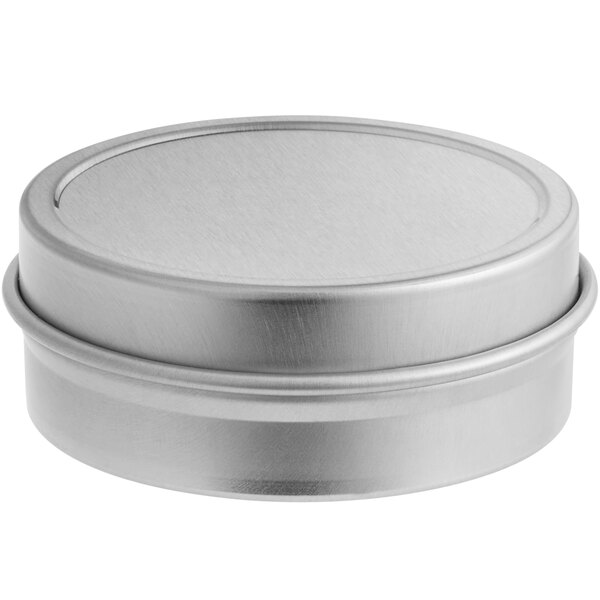 A silver round tin with a round slip cover.