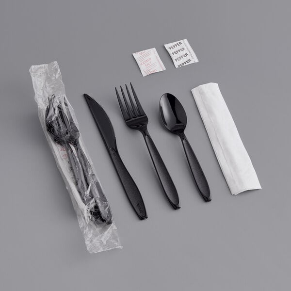 A Solo wrapped plastic fork and spoon set.