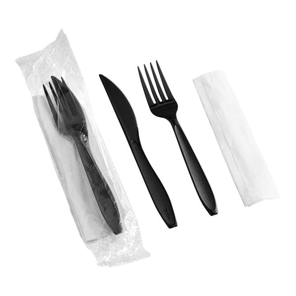 Solo Impress Heavy Weight Black Wrapped Plastic Cutlery Set with Fork, Knife, and Napkin - 250/Case