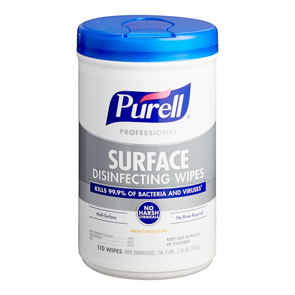 A white Purell container of surface disinfecting wipes with a blue lid.