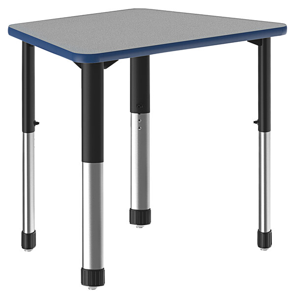 A trapezoid-shaped Correll desk with a gray top and black legs with a blue band.