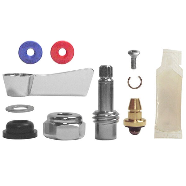 A Fisher brass swivel stem repair kit on a table.
