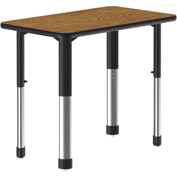 A Correll rectangular table with black thermal-fused laminate top and metal legs.