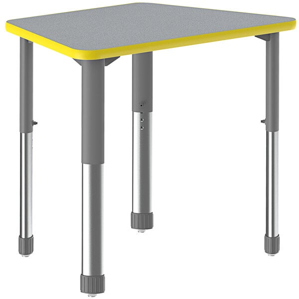 A gray and yellow trapezoid-shaped Correll collaborative desk with metal legs.