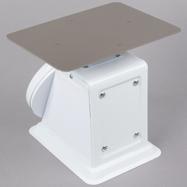 A white rectangular Cardinal Detecto portion scale with a rotating silver dial.