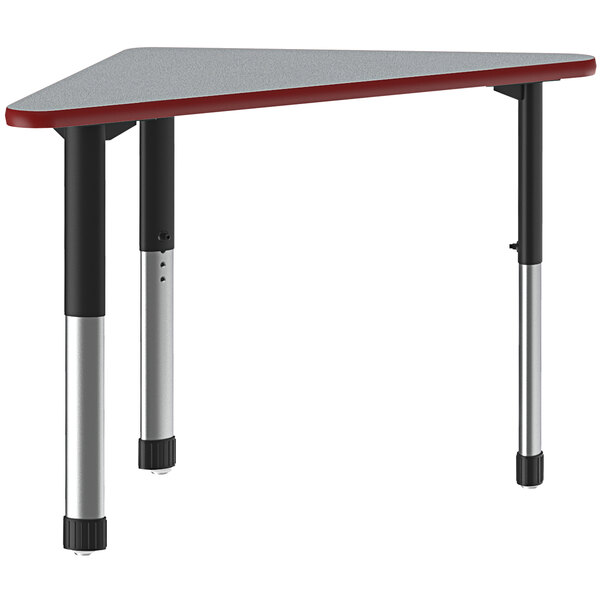 A triangular gray granite table with a red band and metal legs.