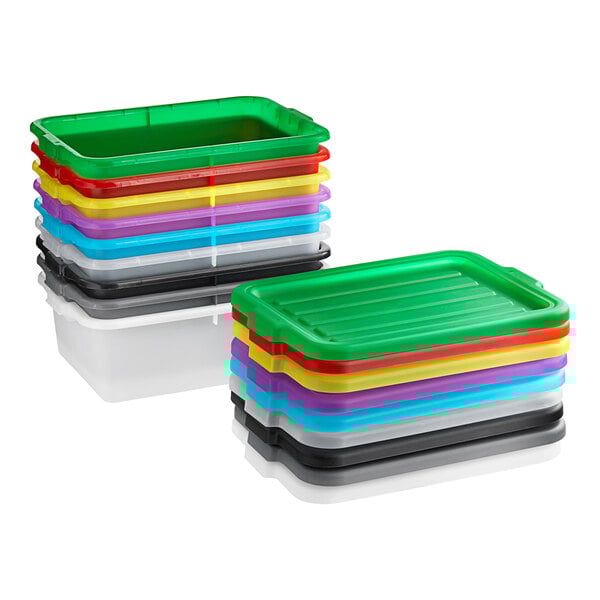 A stack of colorful plastic containers including green and red Vigor bus tubs.