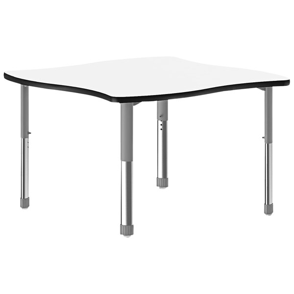 A white rectangular Correll collaborative desk with black and gray legs.