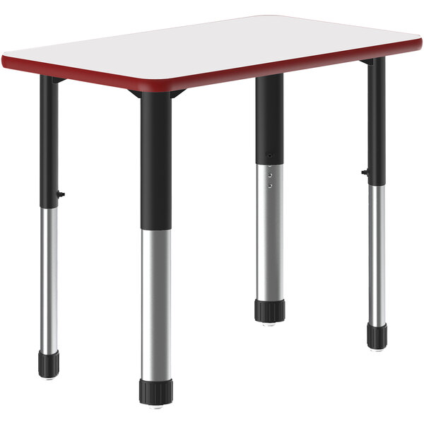 A white rectangular Correll table with a red frame and black legs.