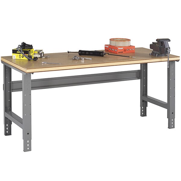 A Tennsco workbench with tools on it.