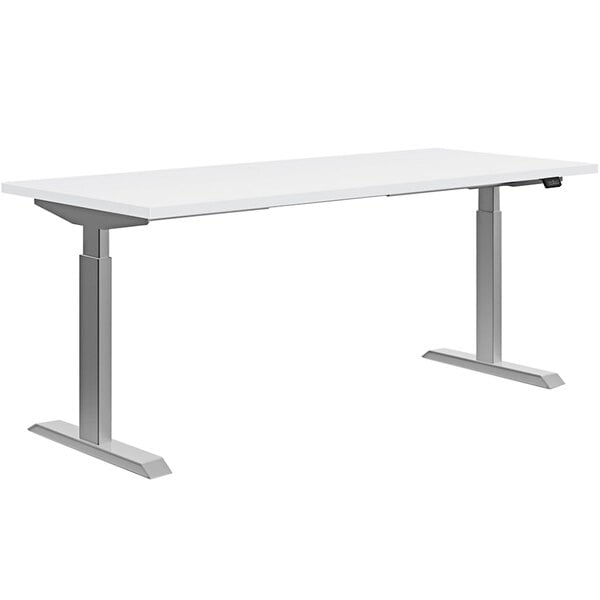 A white rectangular desk with metal legs.