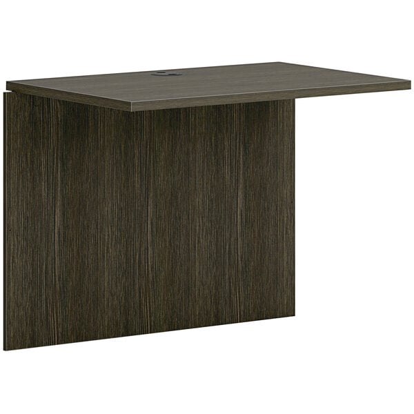 A brown rectangular office bridge with a dark wood finish.