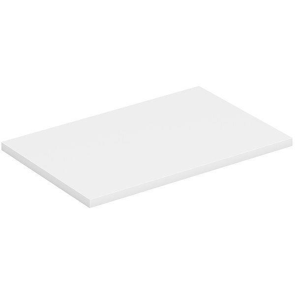 A white rectangular object with a pencil on top.