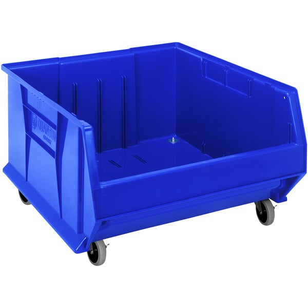 A Quantum blue plastic storage bin with wheels.