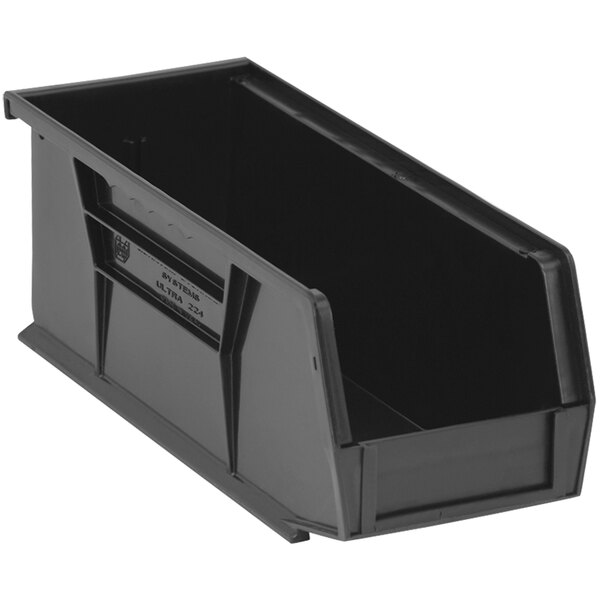 A Quantum black plastic hanging bin with a handle.