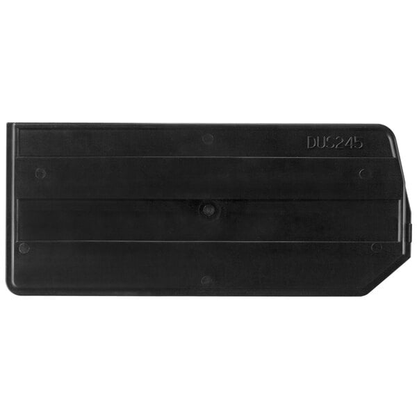 A black rectangular Quantum divider with text and a hole in it.