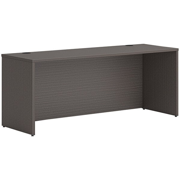 A slate teak laminate HON credenza shell.