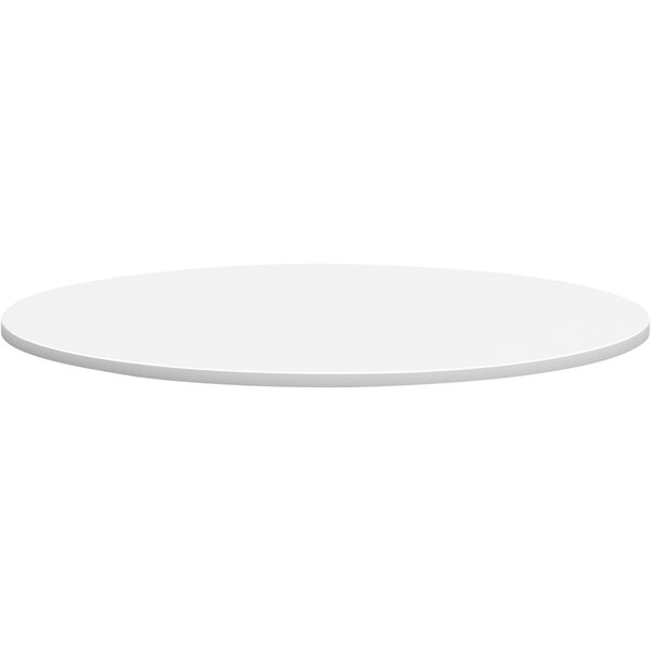 A HON white round conference table top.