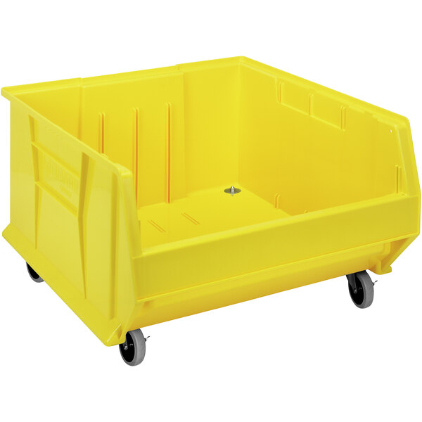 A yellow plastic Quantum Mobile Hulk storage bin on wheels.