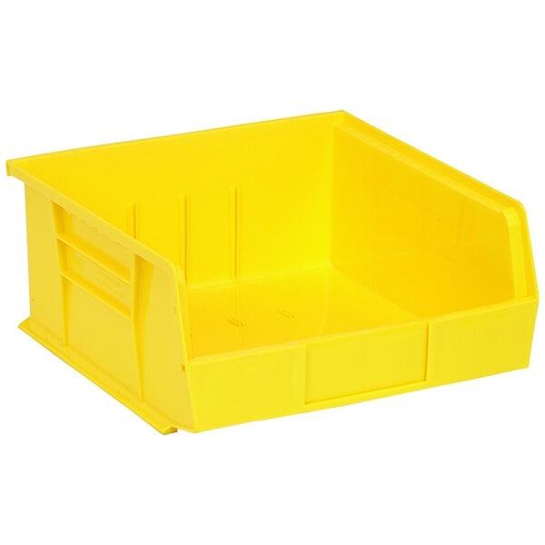 A yellow plastic Quantum hanging bin with a lid.