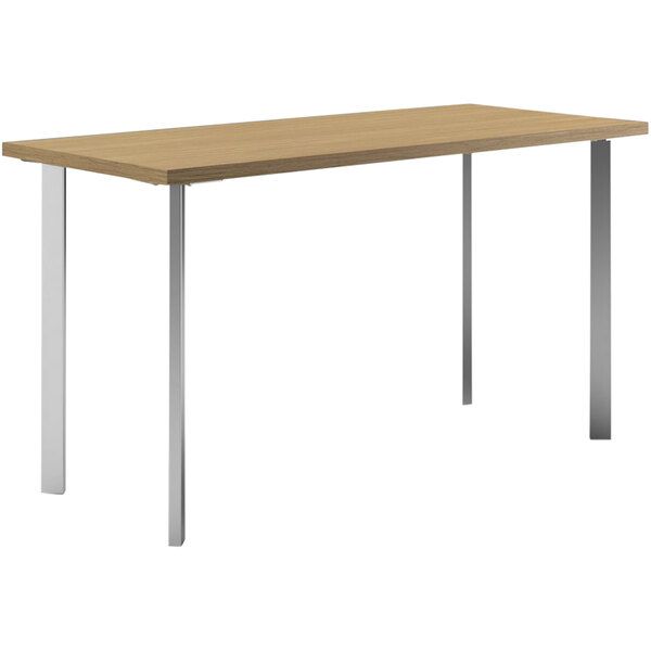 A HON Coze desk with metal legs and a natural wood surface.