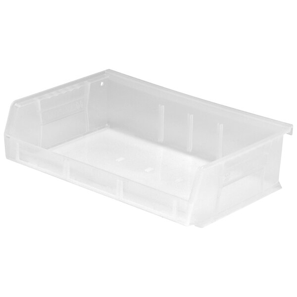 A close-up of a clear plastic Quantum hanging bin with holes.
