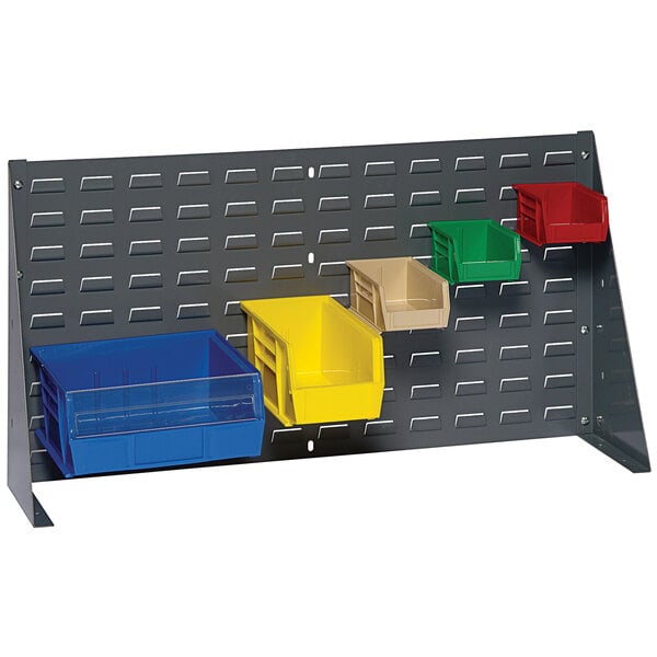 A grey metal Quantum bench rack with bins.