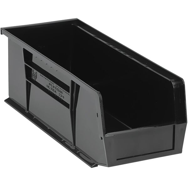 A black plastic Quantum hanging bin with a handle.