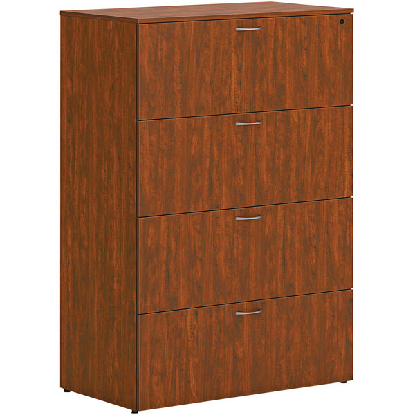 A HON russet cherry wooden lateral file cabinet with 4 drawers.