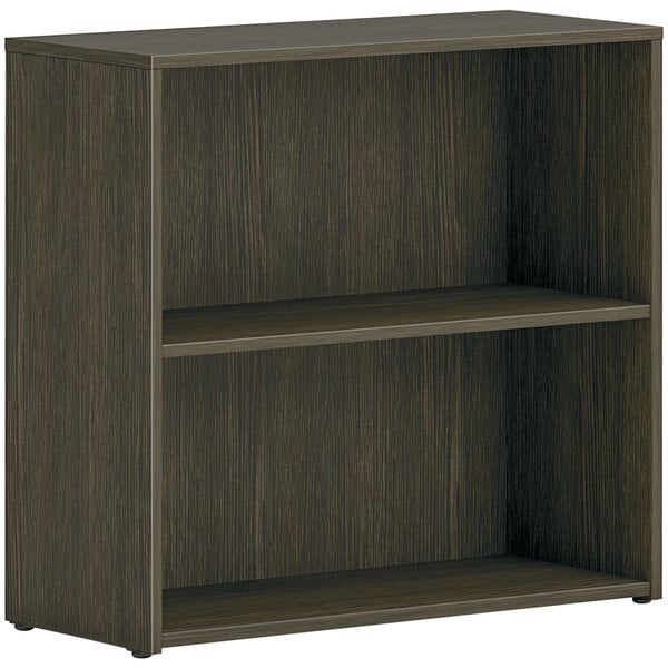 A Java oak laminate HON bookcase with two shelves.