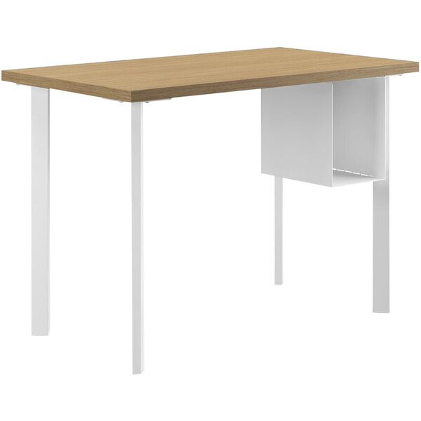 A white HON desk with a wood surface and U-shaped storage shelves.