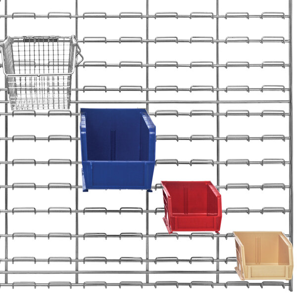 A Quantum wire louvered panel with red and blue plastic bins and small baskets.