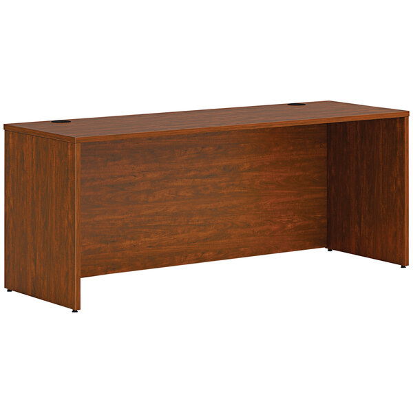 A HON russet cherry laminate credenza shell.