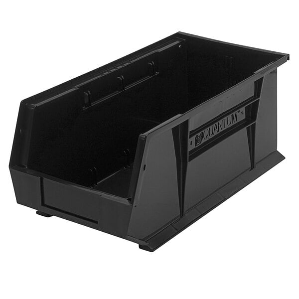 A black plastic Quantum hanging bin with a handle.