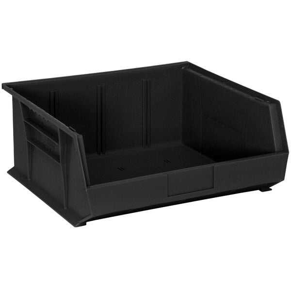 A black plastic Quantum hanging bin with a handle.