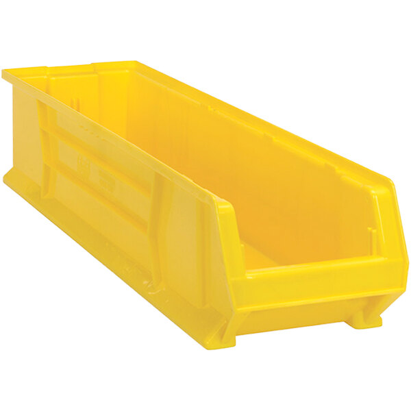 A Quantum yellow plastic bin.