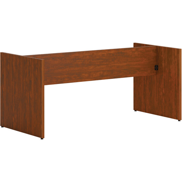 A russet cherry HON laminate slab base for a conference table.