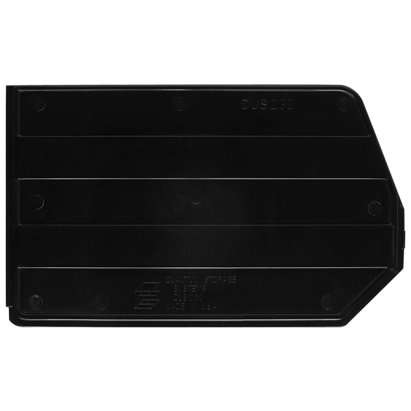 A black plastic rectangular divider with four slots.