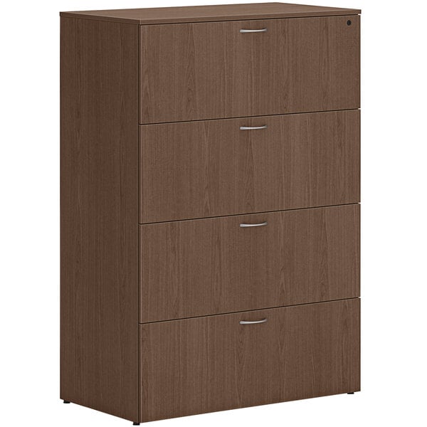 A HON sepia walnut lateral file cabinet with four drawers and silver handles.