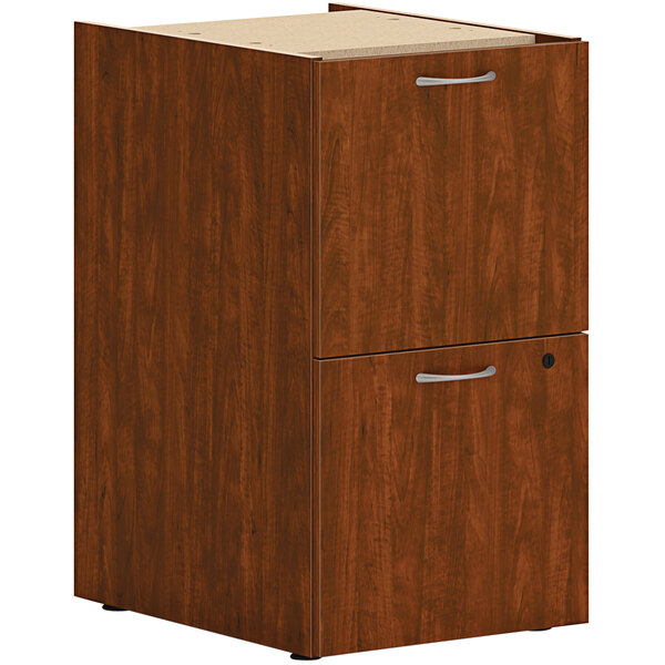 A HON russet cherry wooden file cabinet with 2 drawers.