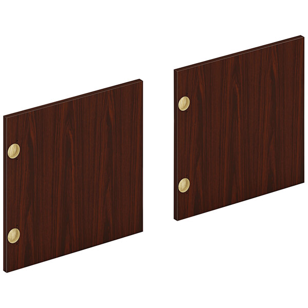 Three mahogany HON doors with brass hardware.