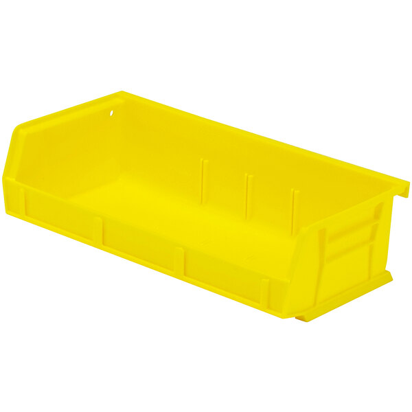 A yellow plastic Quantum hanging bin with a handle.