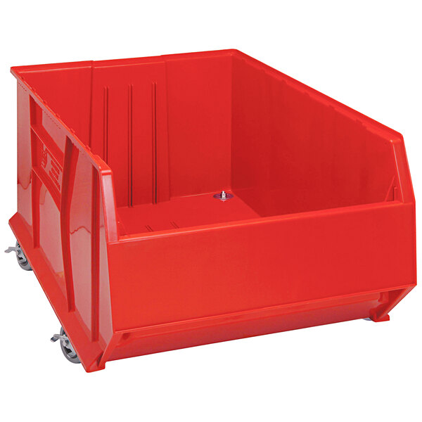 A red plastic Quantum storage bin with wheels.