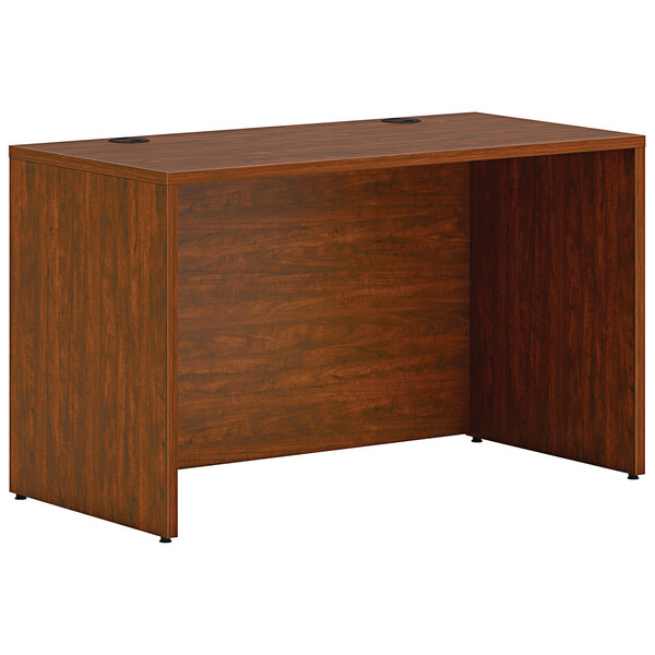 A HON russet cherry laminate credenza shell with a wooden top.