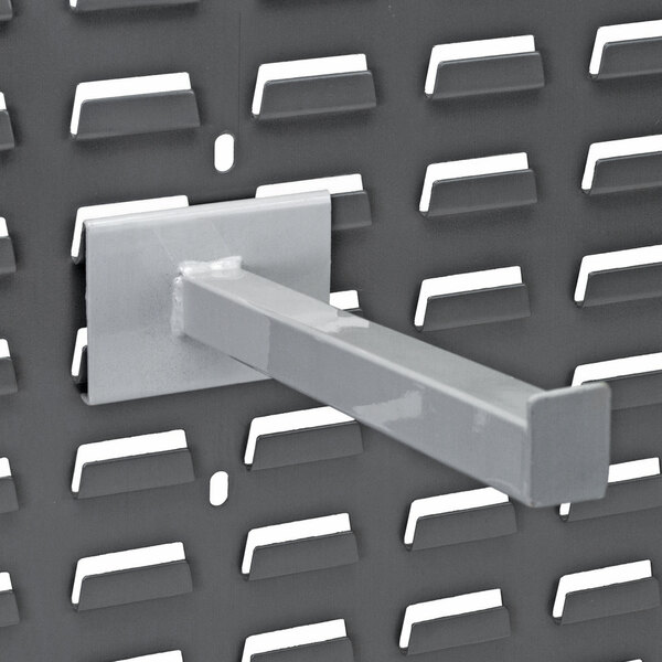 A white metal Quantum double rod for a louvered panel.