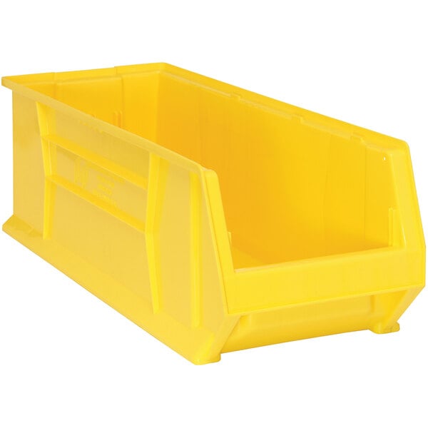 A Quantum yellow plastic bin with a lid.