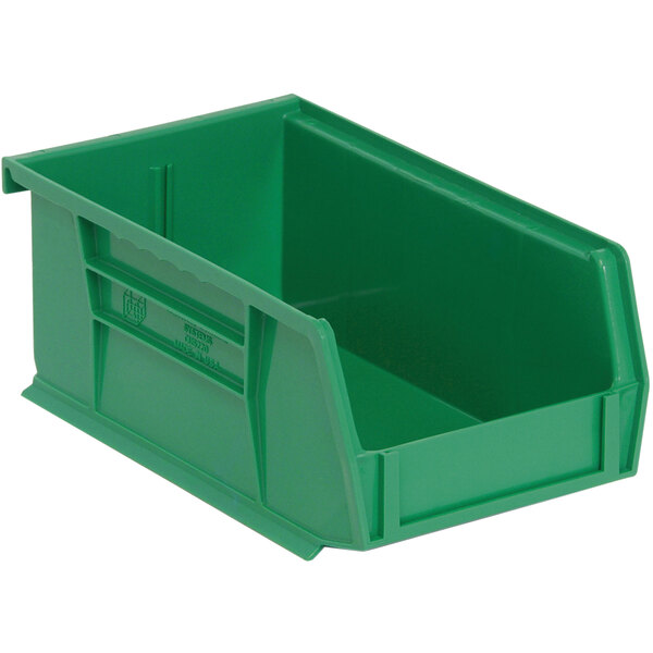 A green plastic Quantum hanging bin with a handle.
